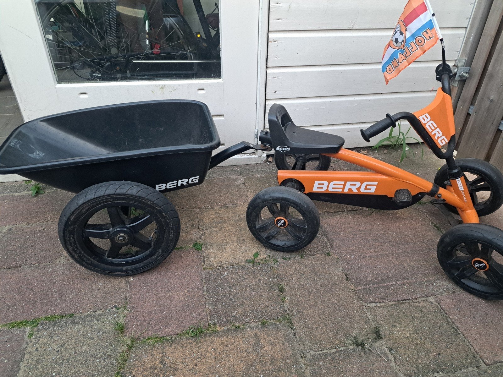 Berg skelter Buzzy orange met aanhanger, Kinderen en Baby's, Speelgoed | Buiten | Skelters, Ophalen of Verzenden, Zo goed als nieuw
