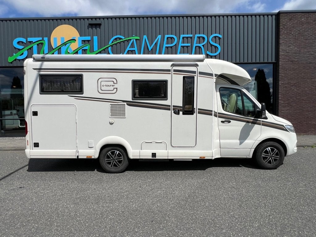 Carthago C-tourer T 143 LE MERDCEDES/2 ZONNEPAN., Caravans en Kamperen, Campers, Tot en met 2, Bedrijf, Carthago, 7 tot 8 meter
