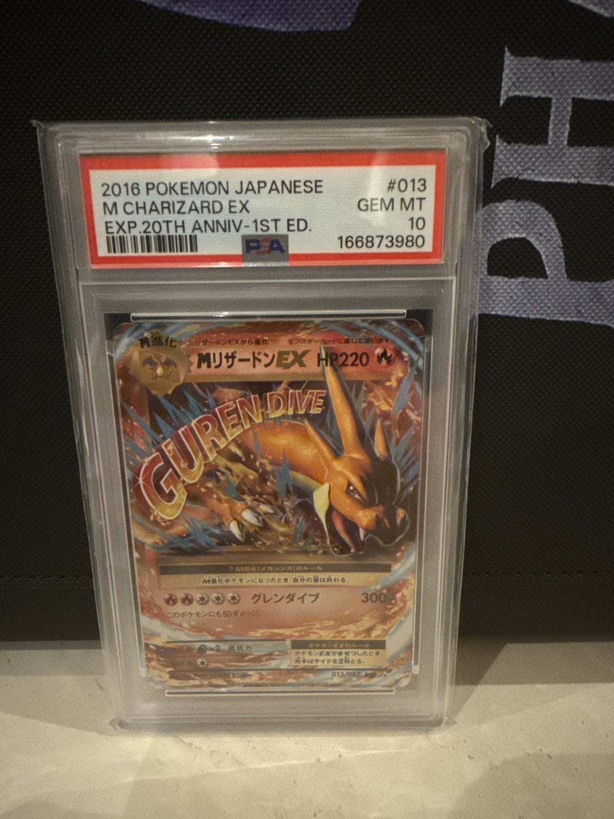 2016 Pokémon Japanse M Charizard EX PSA 10 GEM MT, Ophalen, Zo goed als nieuw, Losse kaart