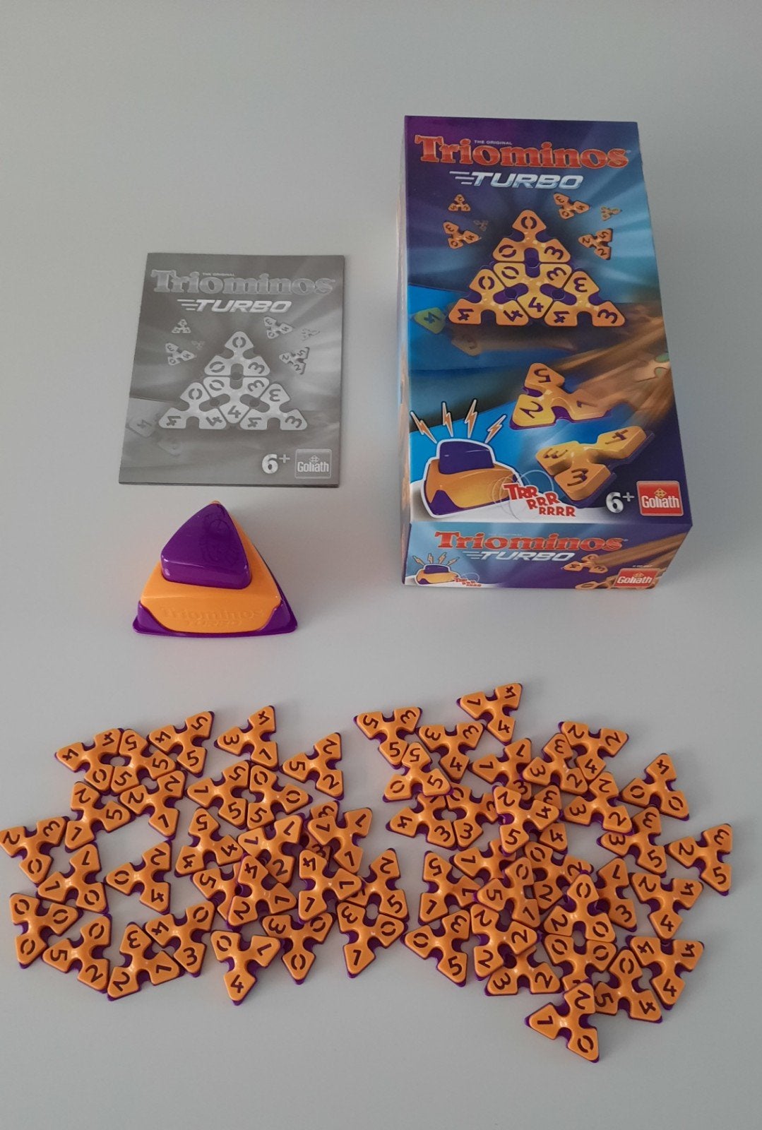 Triominos Turbo spel van Goliath - Compleet en in goede staa, Vijf spelers of meer, Ophalen of Verzenden, Zo goed als nieuw, Goliath