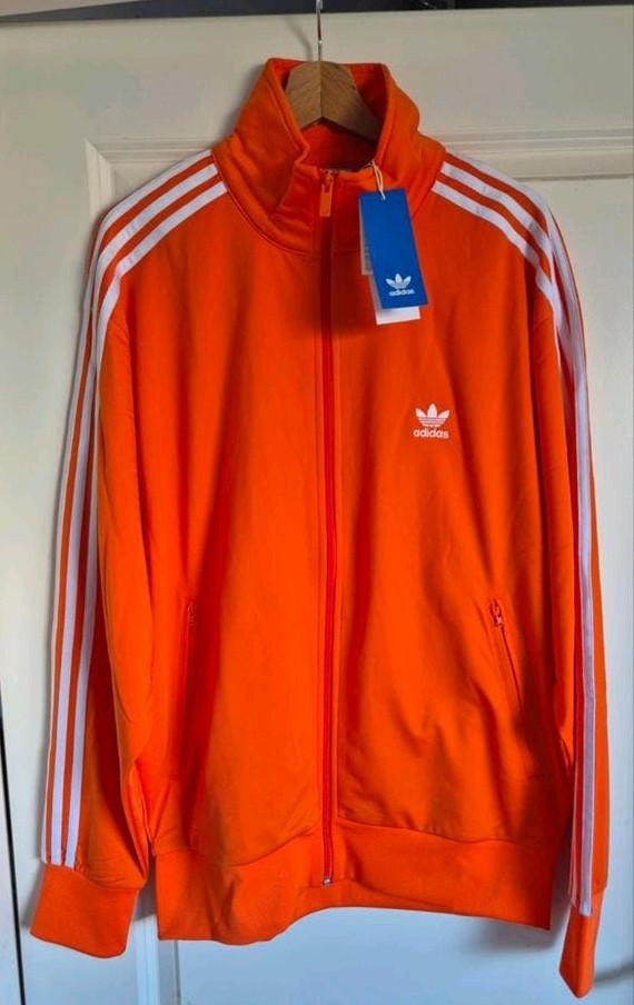 Adidas Firebird Jacket Oranje Asian FIT XL (maat L EU) NIEUW, Kleding | Heren, Sportkleding, Ophalen, Maat 52/54 (L), Nieuw, Oranje