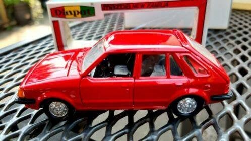 Diapet MAZDA 323 NEW FAMILIA ROOD YONEZAWA TOYS G141, Ophalen of Verzenden, Nieuw, Auto, Overige merken