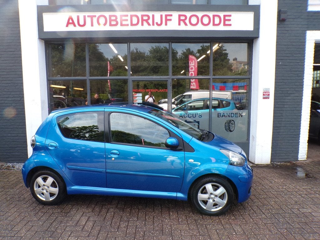 Toyota Aygo 1.0-12V 5-Drs Automaat Bleu AIRCO,LMV,VELE EXTRA, Gebruikt, Met garantie (alle), 68 pk, Bedrijf