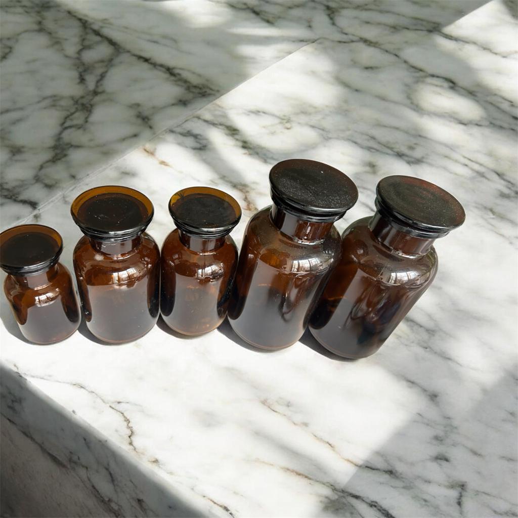 Set van 5 vintage apothekersflessen amberkleurig glas, Ophalen