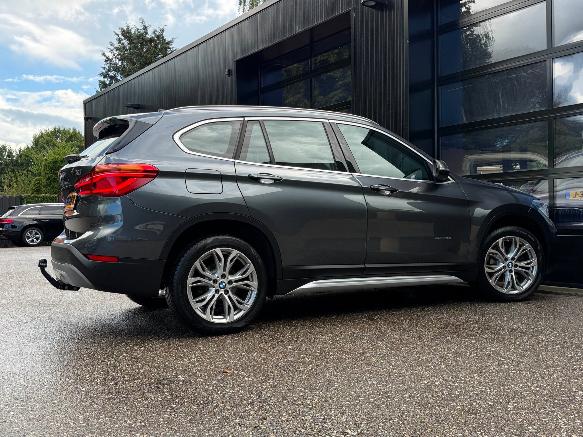 BMW X1 SDrive18i High Executive Xenon Navi Trekh. Cruise, Auto's, Gebruikt, Euro 6, Leder en Stof, 19 km/l