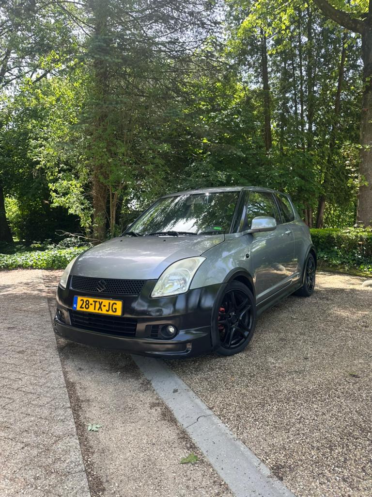 Suzuki Swift 1.3 3D 2007 Grijs keyless, Auto's, Suzuki, Stof, Swift, Origineel Nederlands, Handgeschakeld