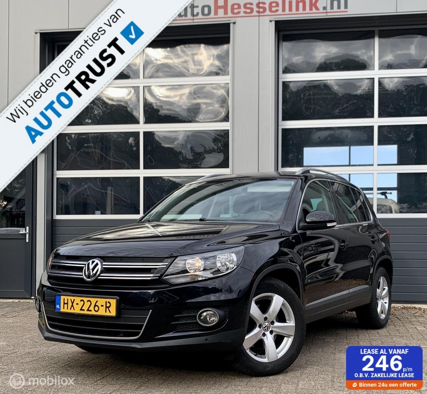 Volkswagen Tiguan 1.4 TSI Sport & Styl |TREKHAAK|NAV|PDC, Auto's, Voorwielaandrijving, 125 pk, Gebruikt, Euro 6
