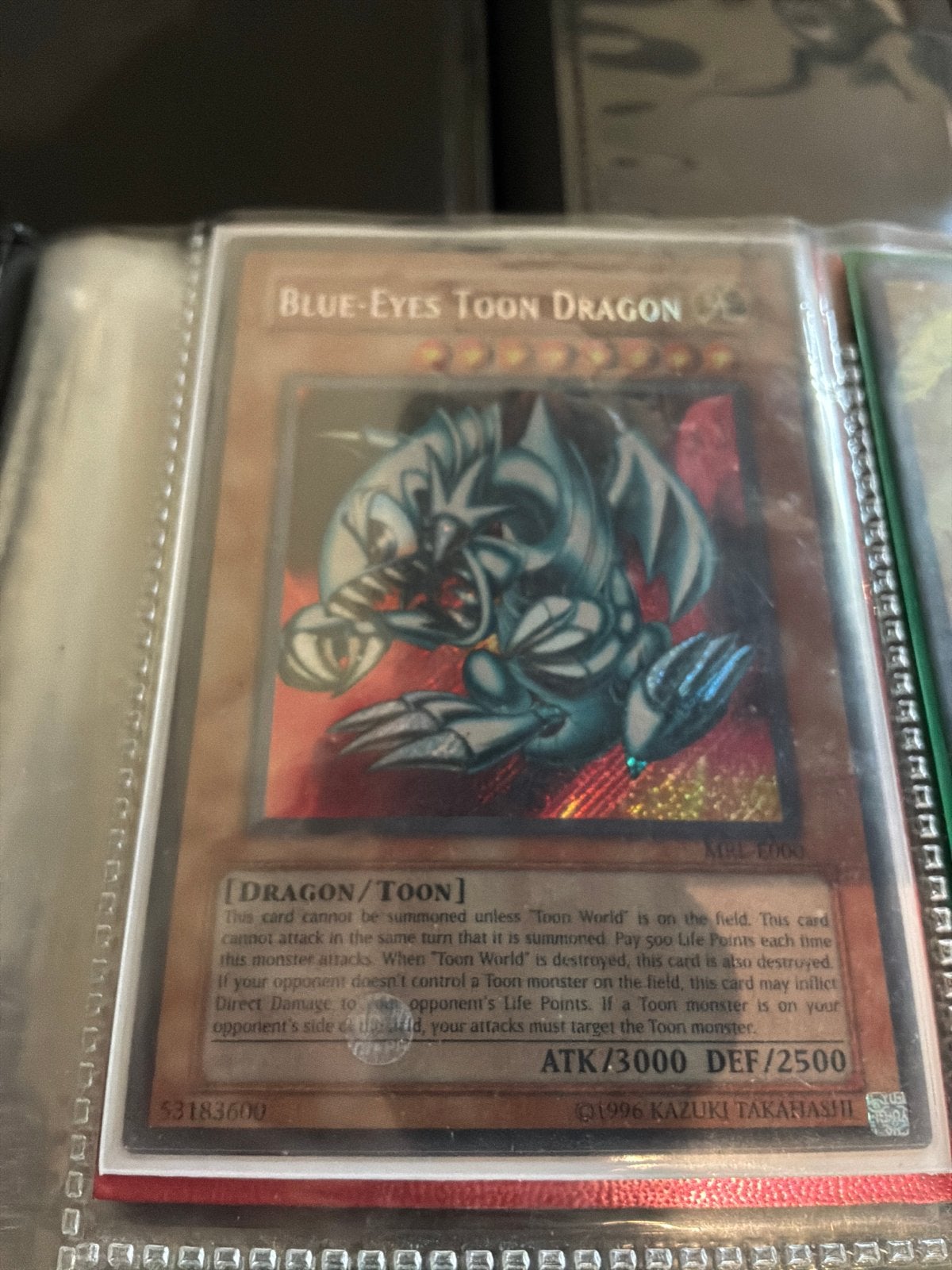 Yu-Gi-Oh! Blue-Eyes Toon Dragon MRL-E000, Ophalen of Verzenden, Zo goed als nieuw