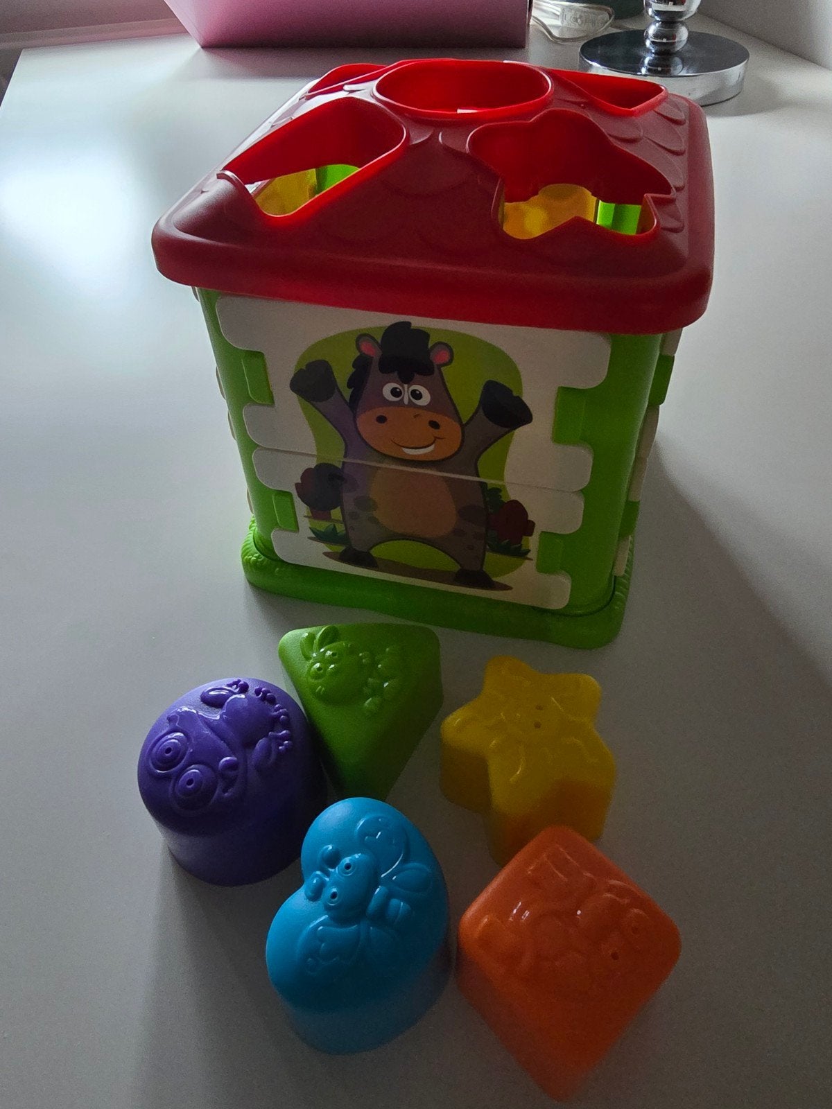 Leuke vormenstoof/puzzel, Ophalen