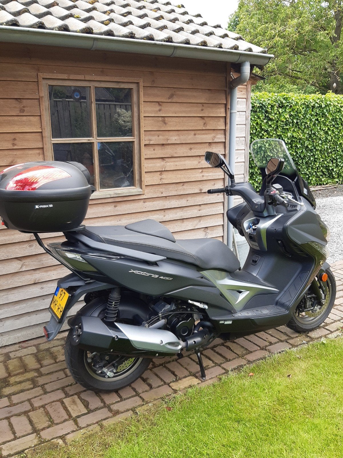 Motorscooter Kymco Xciting 400i, Bedrijf, Scooter