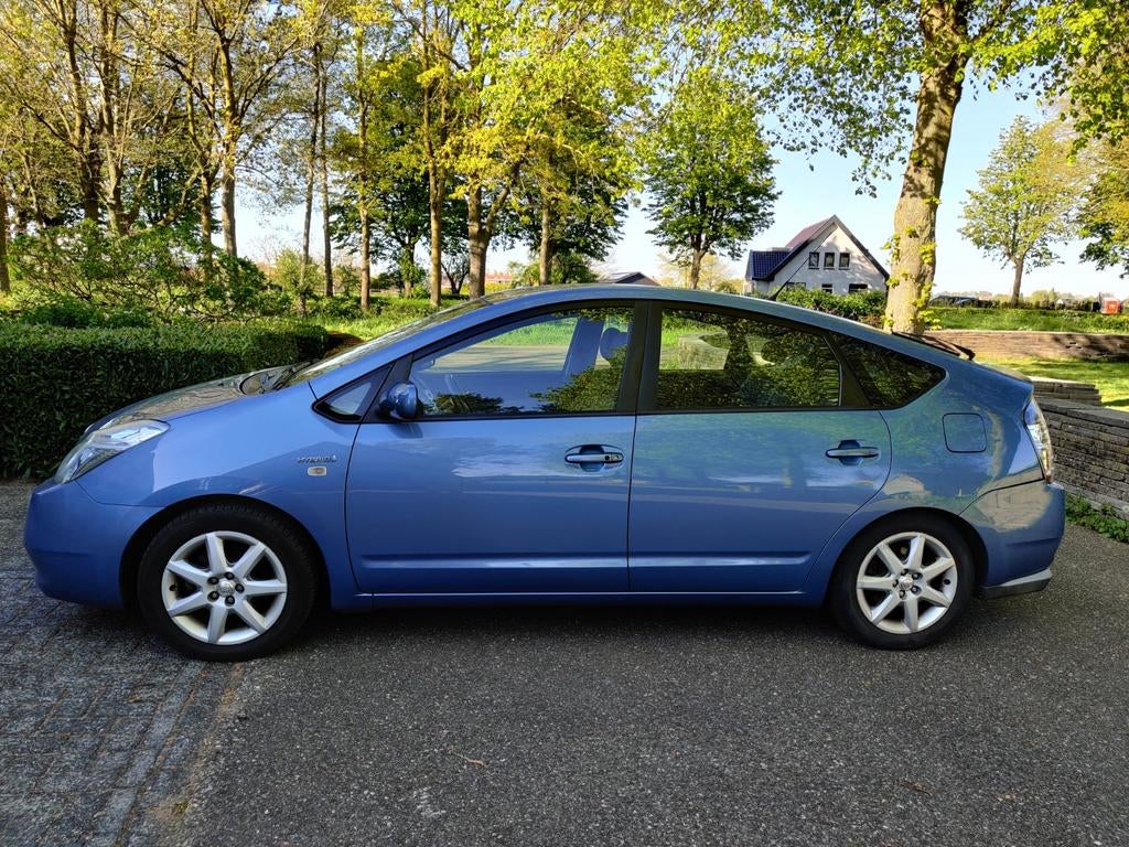 Toyota Prius 1.5 HSD 2007 Blauw, Auto's, Opel, 1497 cc, 4 cilinders, Blauw, 23 km/l