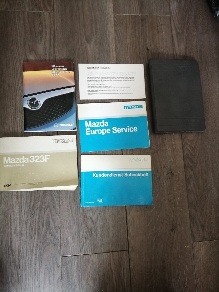 Compleet mapje boekjes MAZDA 323F type BA  1996-1999 (duits), Ophalen of Verzenden