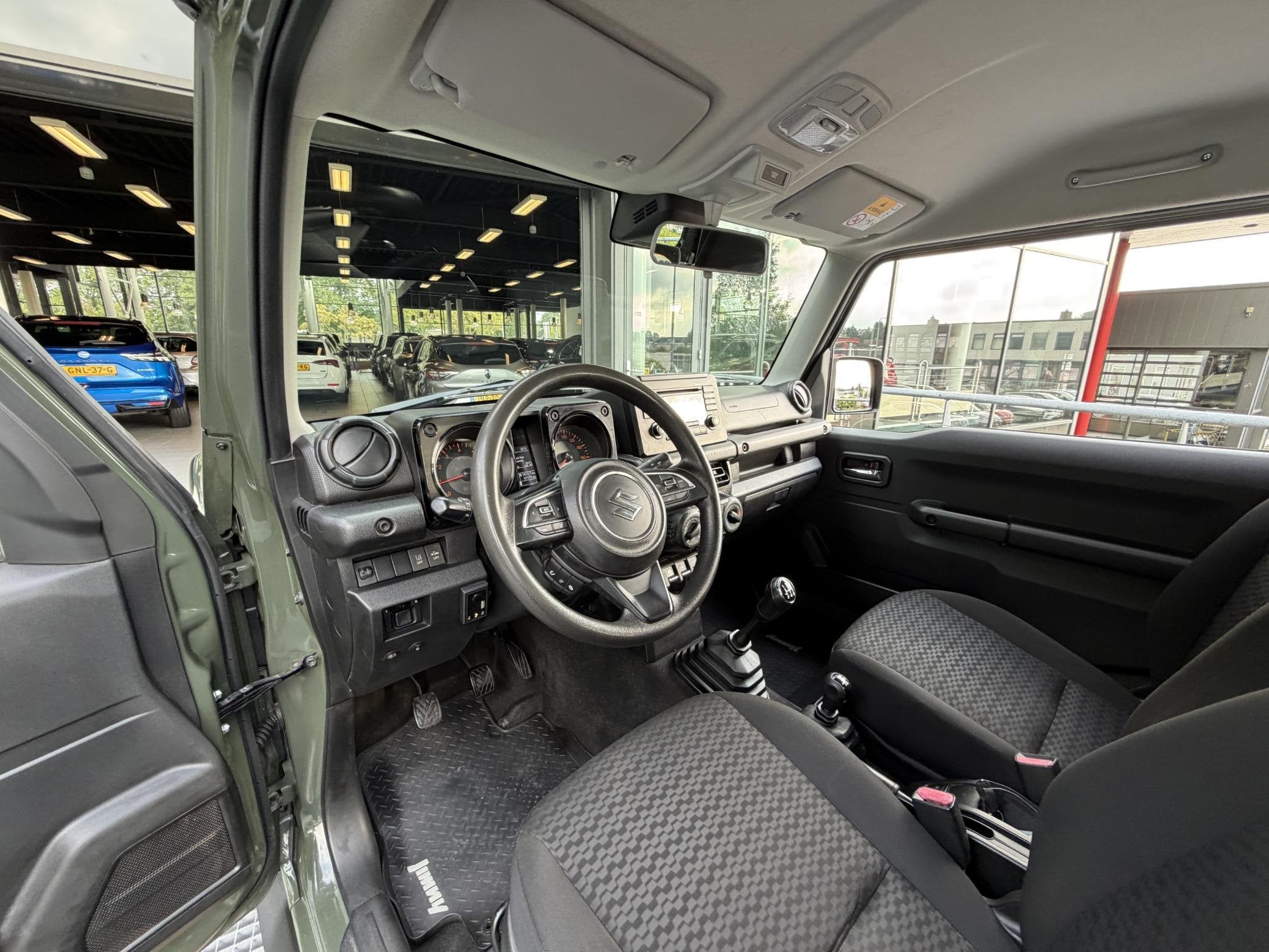 Suzuki Jimny 1.5 Comfort AllGrip 4-zits 102PK | Stoelverwarm, Auto's, Keurmerk '100% Onderhouden', Gebruikt, 4 cilinders, Lichtsensor