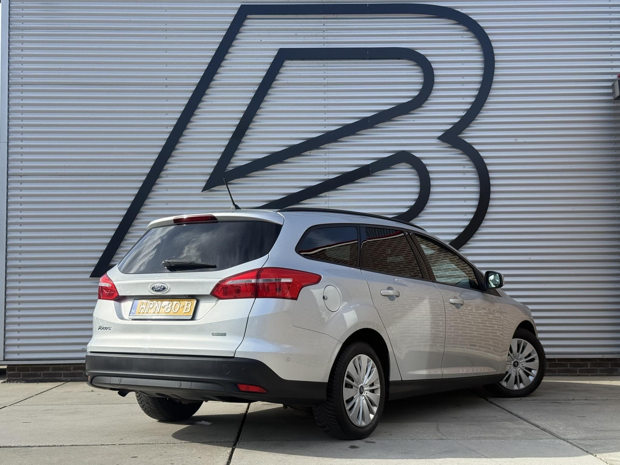 Ford Focus Wagon 1.0 Lease Edition 1e Eigenaar|Navi|Camera|C, Gebruikt, Euro 6, Verwarmde buitenspiegels, Handgeschakeld