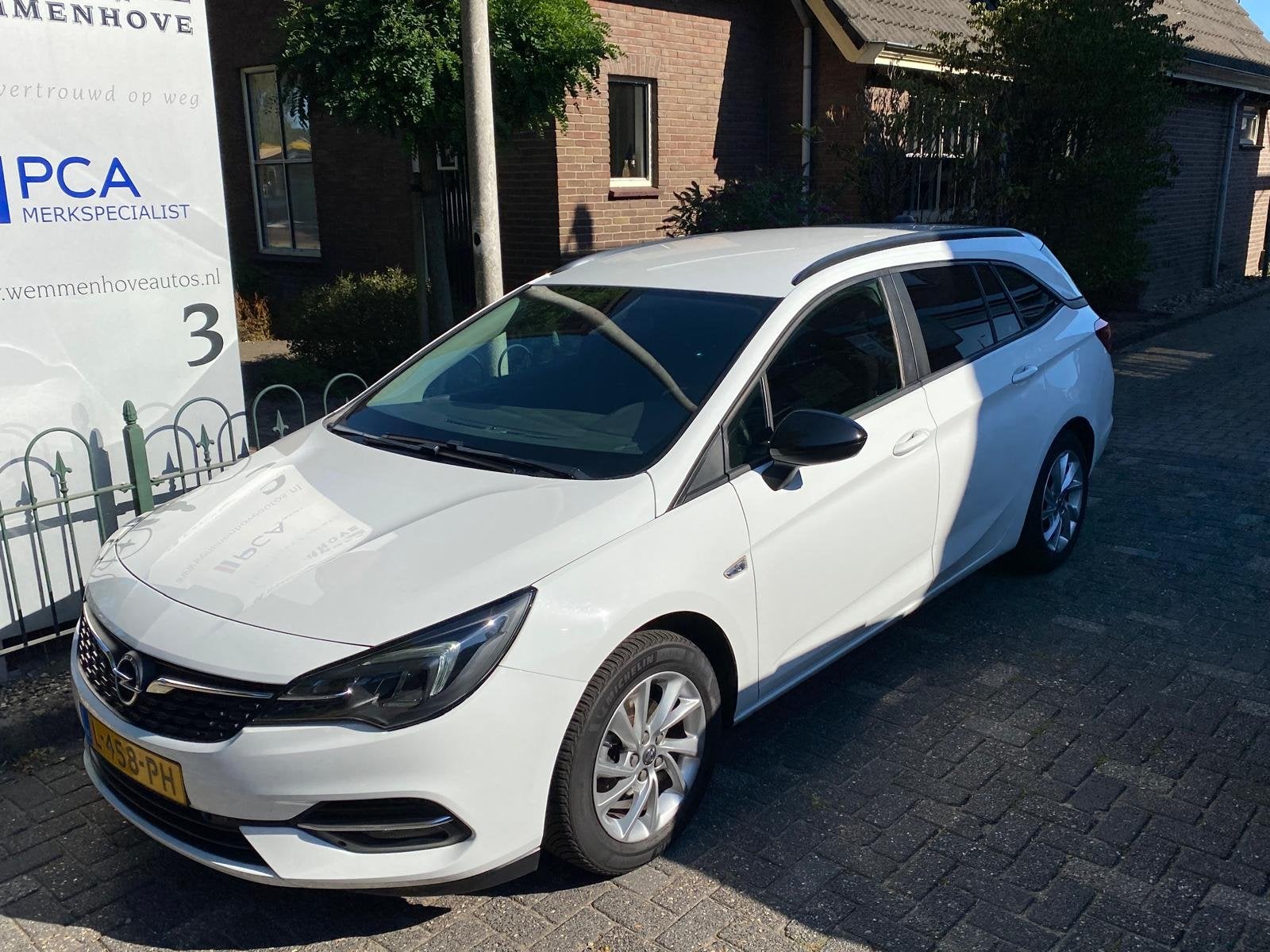 Opel Astra Sports Tourer 1.2 Business Edition (bj 2021), Auto's, 12 maanden, Stof, Gebruikt, 1199 cc
