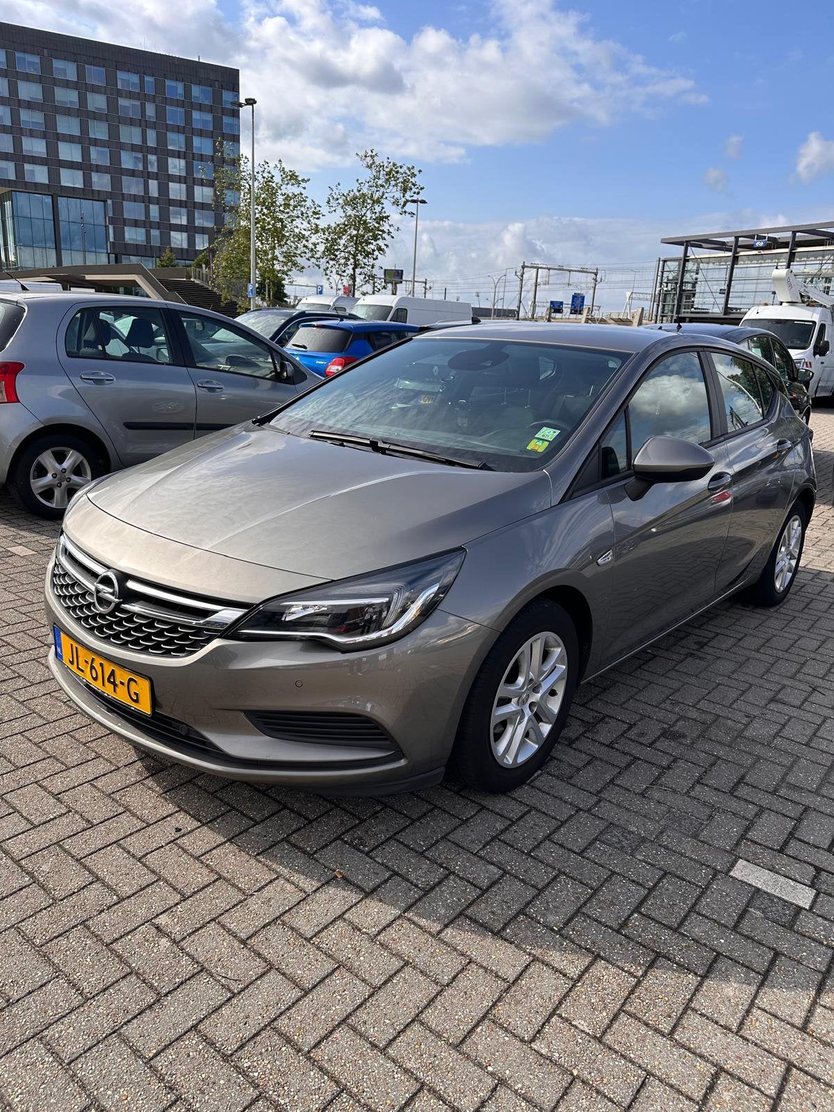 Opel Astra 1.0 Turbo 77KW 5D 2016 Bruin, Auto's, Opel, Bruin, 610 kg, 23 km/l, Origineel Nederlands