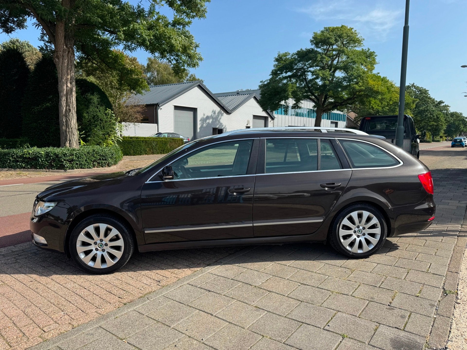 Skoda Superb Combi 1.8 TSI Active Clima Elek Pakket Navi Cru, Auto's, Voorwielaandrijving, Gebruikt, Zwart, 4 cilinders