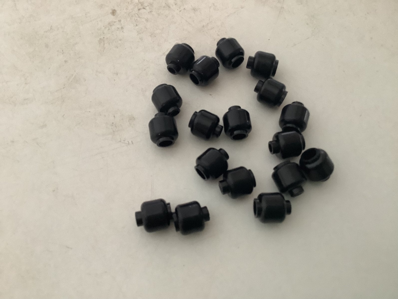 Lego minifiguur hoofd onbewerkt zwart (1), Kinderen en Baby's, Speelgoed | Duplo en Lego, Ophalen of Verzenden, Gebruikt, Losse stenen
