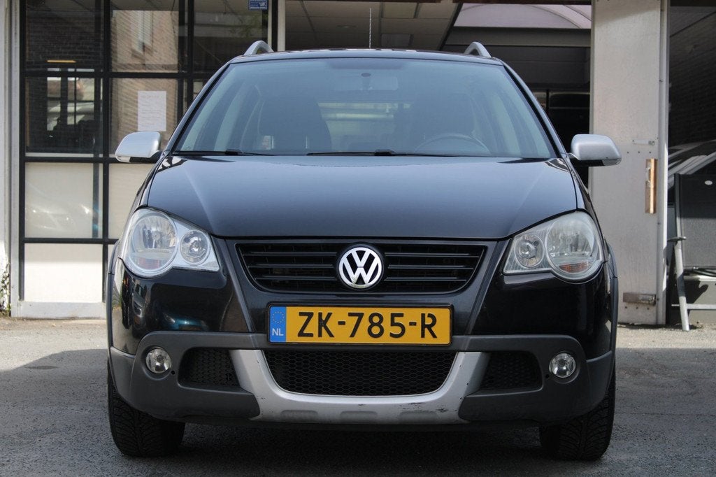 Volkswagen Polo 1.4-16V Comfortline Cross | Airco | Elec ram, Voorwielaandrijving, Gebruikt, Zwart, Stoelverwarming