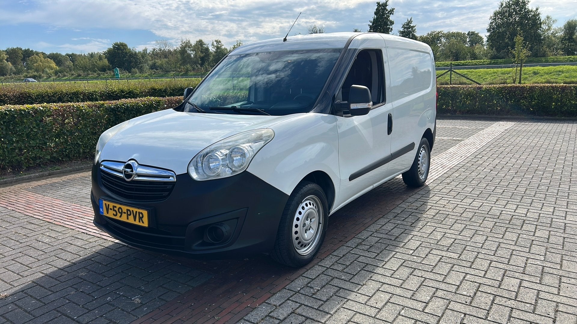 Opel Combo 1.4 70KW 2012, Auto's, Voorwielaandrijving, Stof, Zwart, Wit