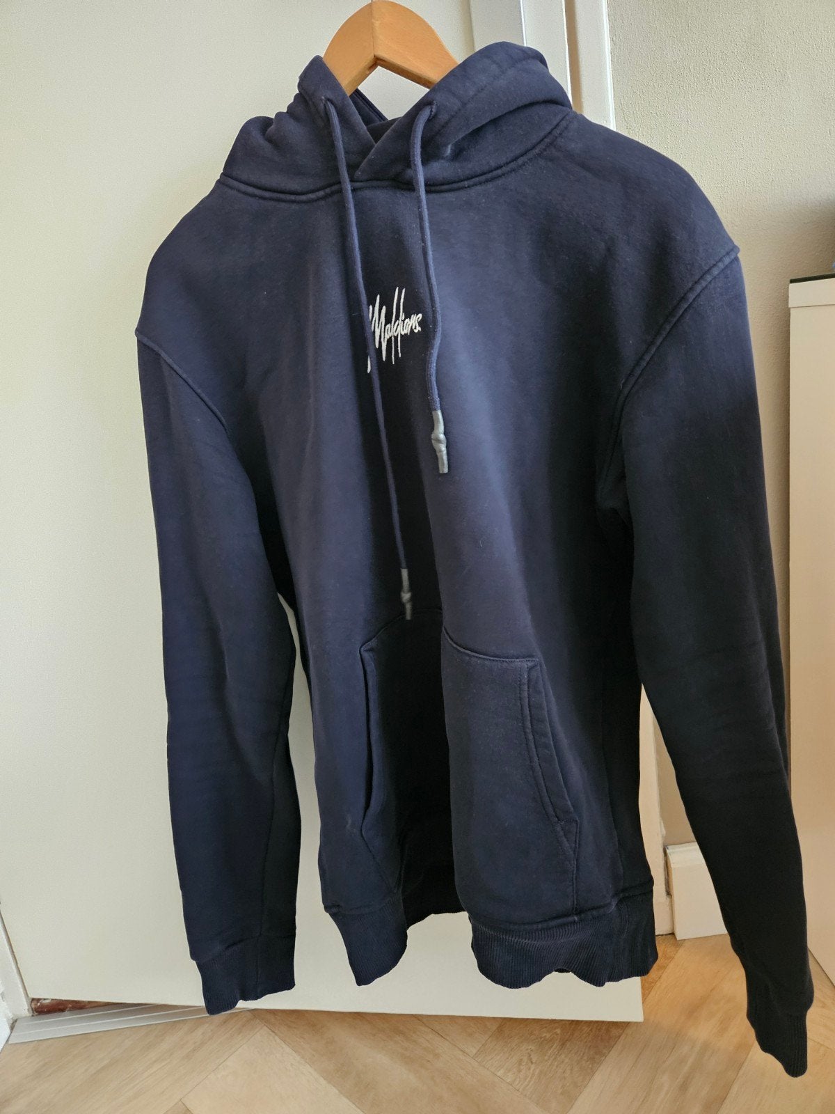Malelions captain hoodie, zgan, Ophalen, Zo goed als nieuw, Maat 56/58 (XL)