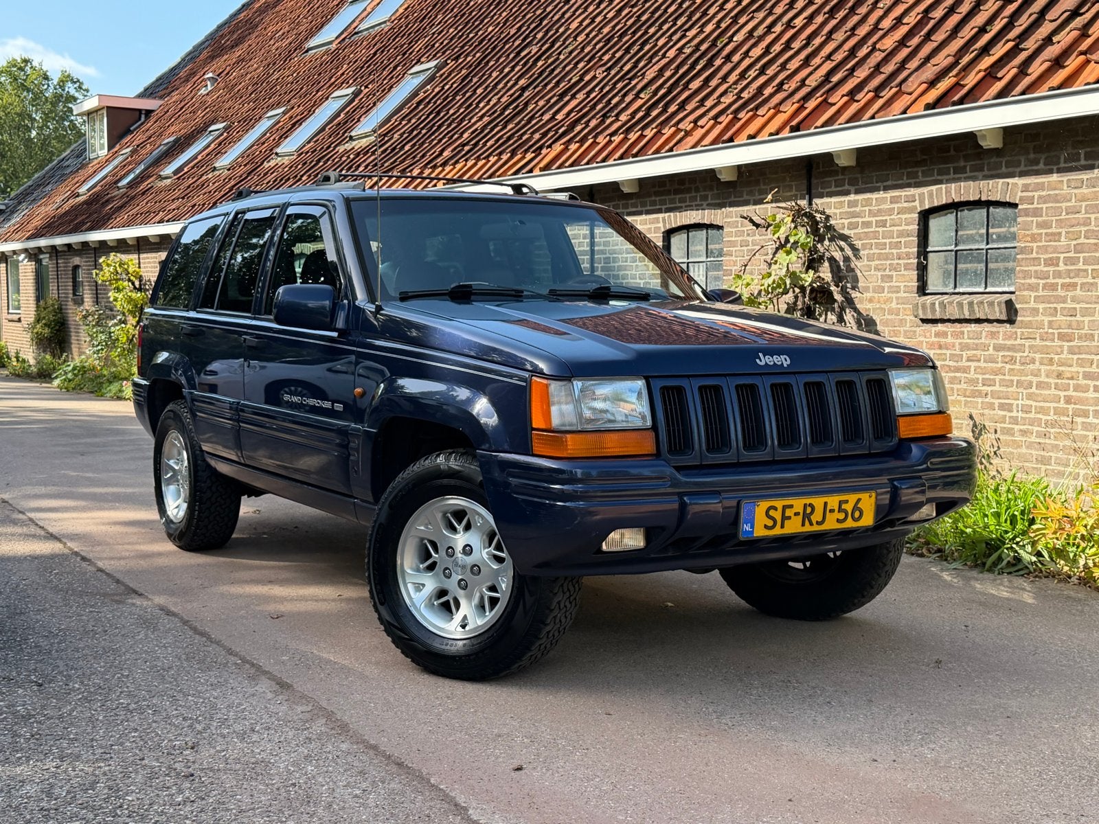Jeep Grand Cherokee 5.2 V8 Limited Automaat | Youngtimer |, Automaat, Blauw, 5200 cc, Vierwielaandrijving