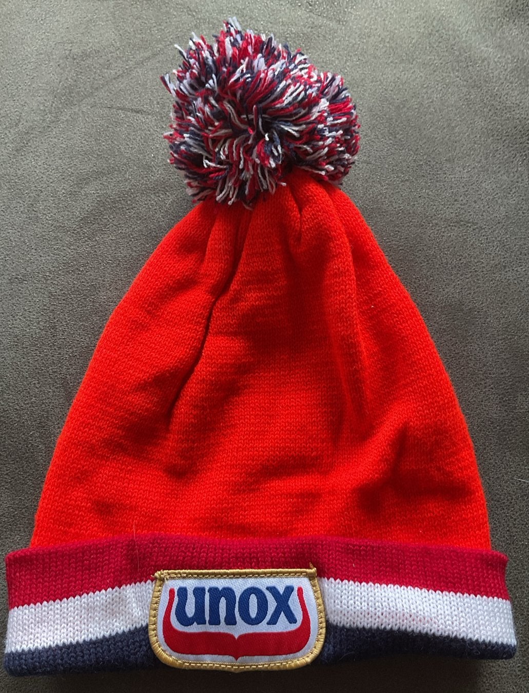 Unox Muts met Pompon - Zo goed als nieuw, Kleding | Dames, Ophalen of Verzenden, Zo goed als nieuw, Maat 38/40 (M), Muts