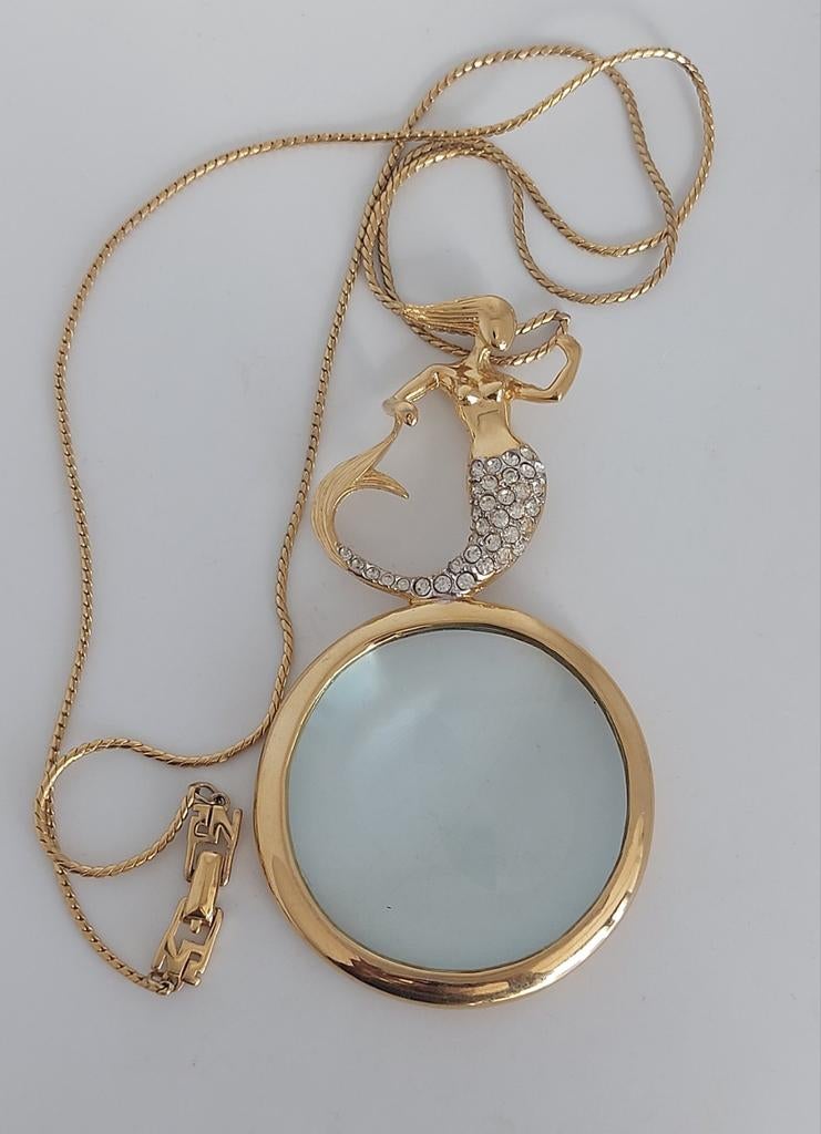 Vintage Nina Ricci vergulde design ketting met zeemeermin, Ophalen of Verzenden, Goud, Met hanger