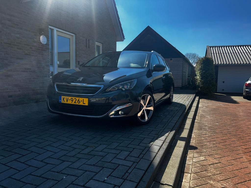 Peugeot 308 1.2 E-thp 96KW/130PK SW AUT 2015 Grijs, Auto's, Zwart, 635 kg, Leder, 19 km/l