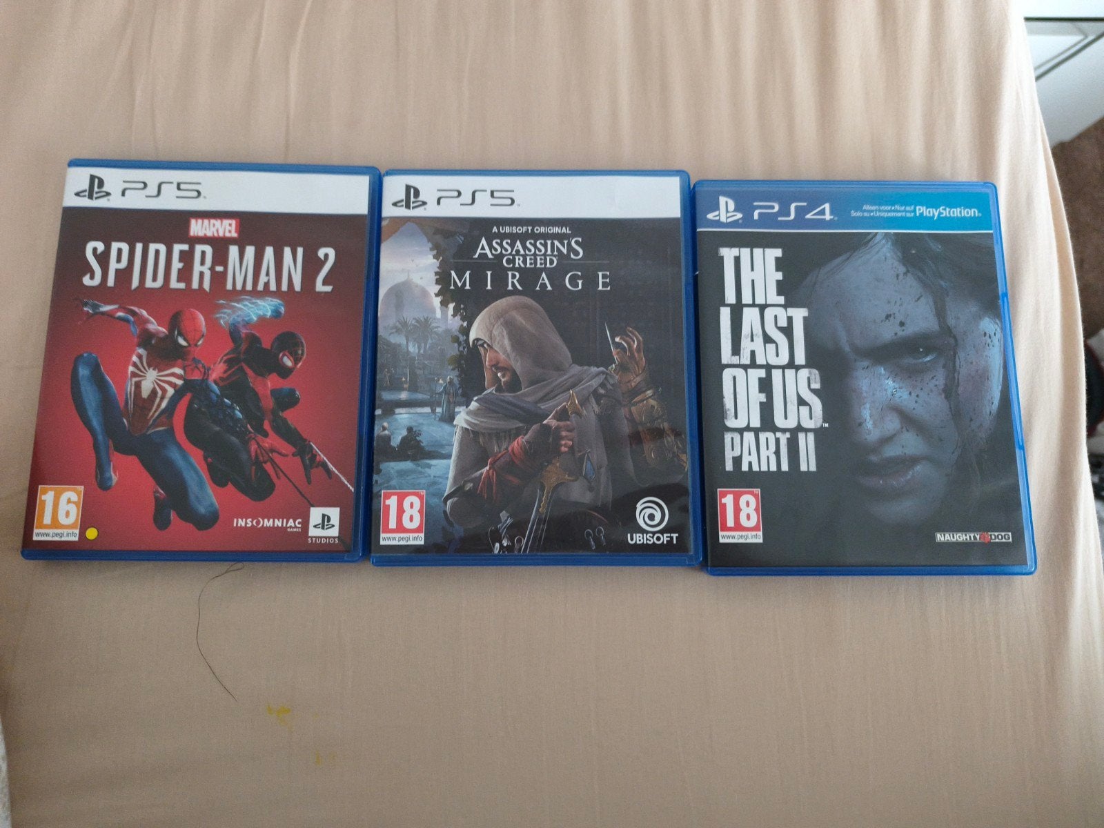 PS5/PS4 Spellen: Spider-Man 2, AC Mirage, Last of Us 2, Spelcomputers en Games, Games | Sony PlayStation 5, 1 speler, Zo goed als nieuw