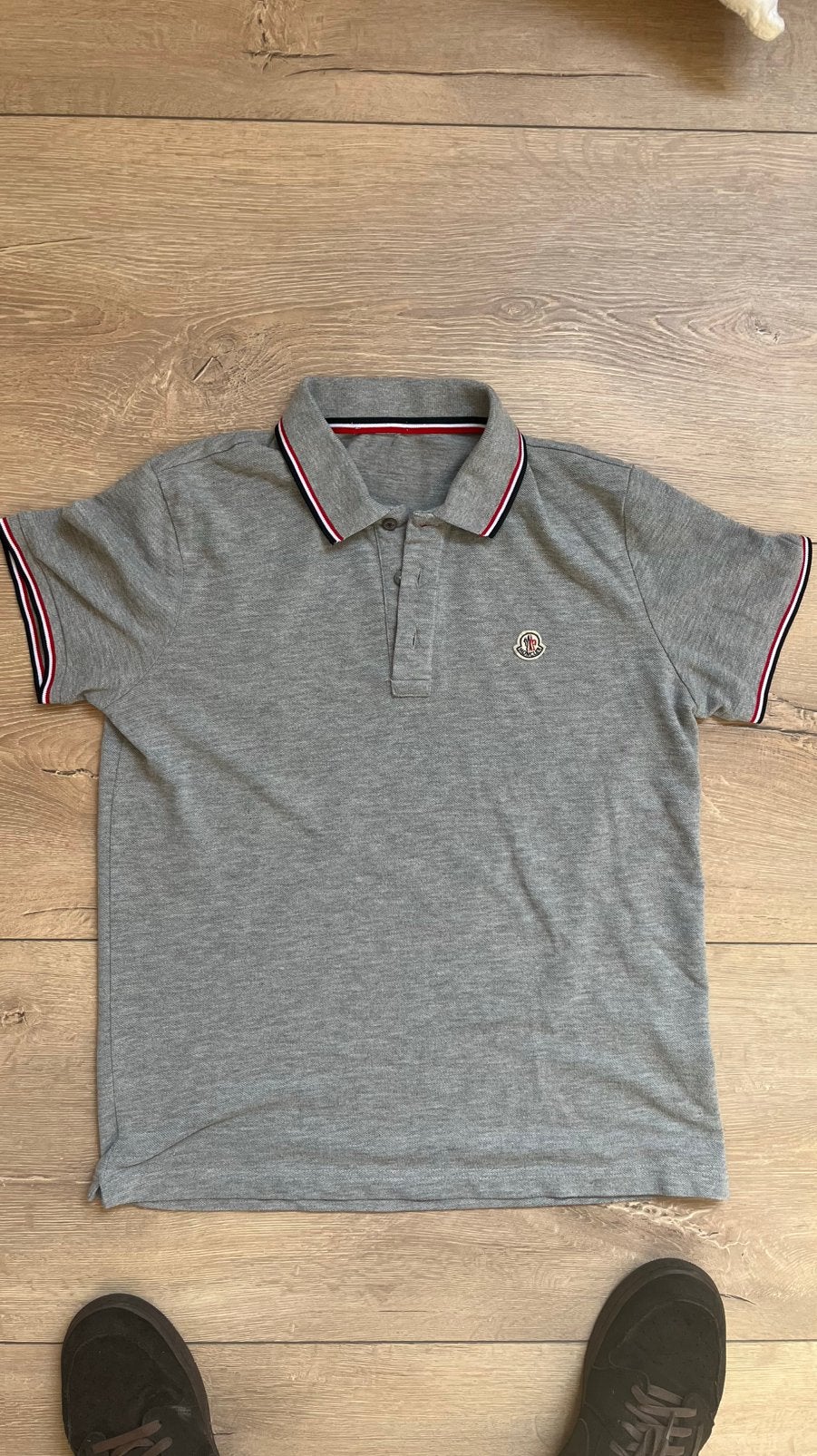 Moncler polo, Ophalen of Verzenden, Zo goed als nieuw, Zwart