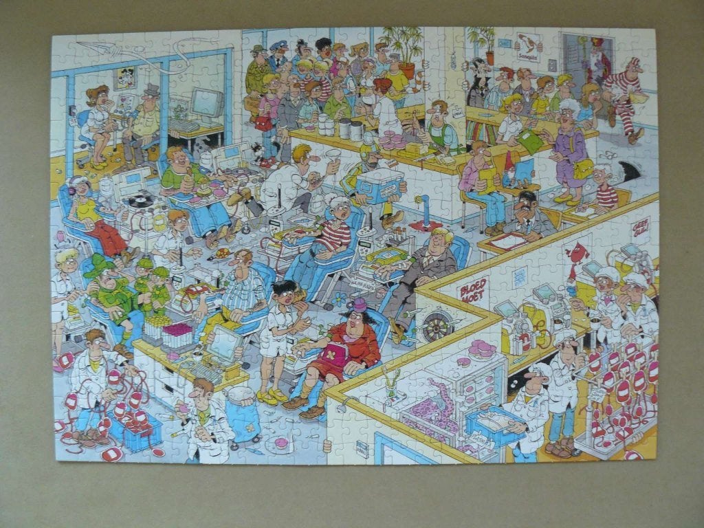Jan van Haasteren puzzel Sanquin Bloedbank 500 stukjes., Ophalen of Verzenden, 500 t/m 1500 stukjes, Zo goed als nieuw, Legpuzzel