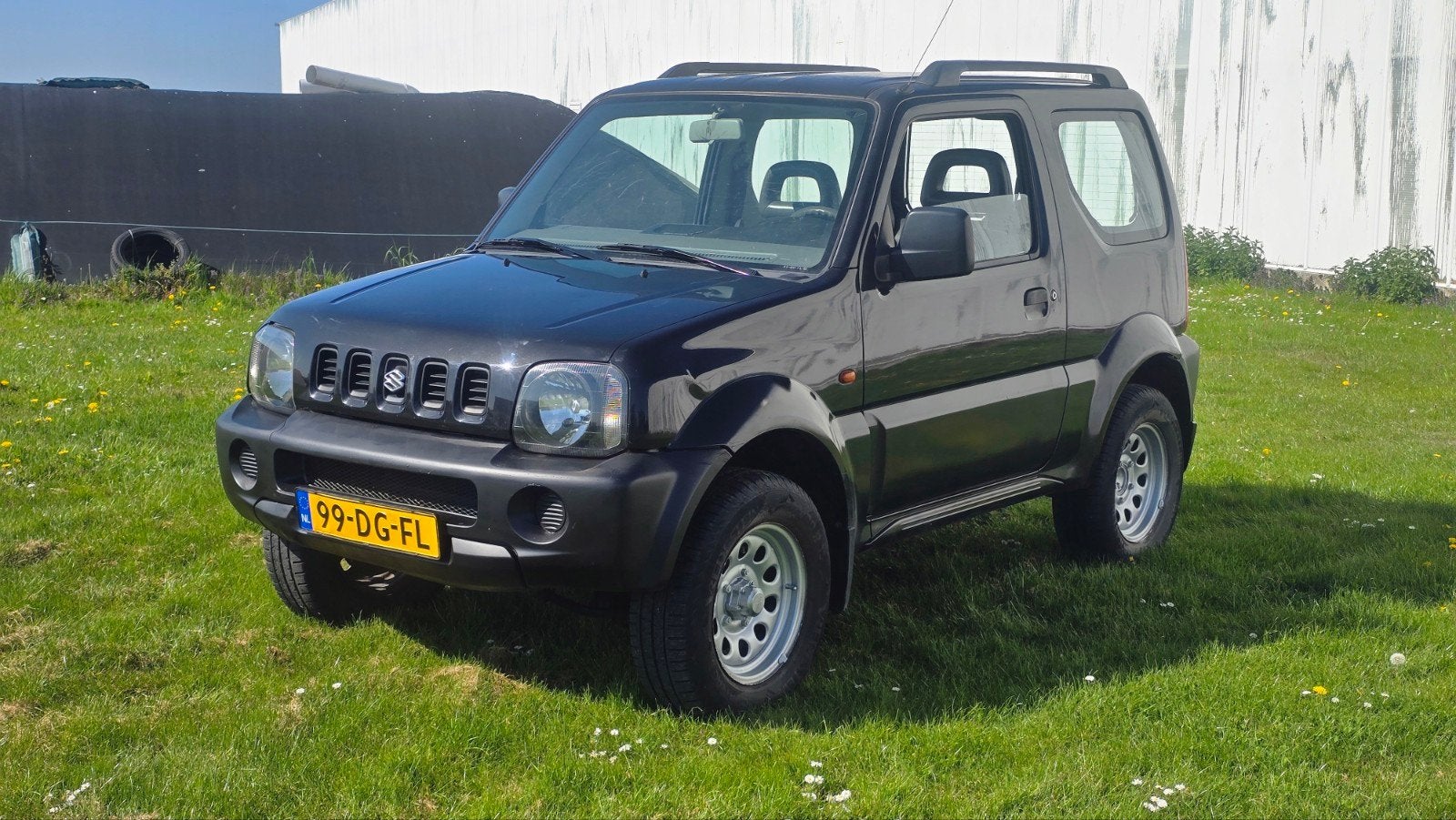 Suzuki Jimny 1.3 JX 4WD 1999 Zwart, Auto's, Stof, 40 €/maand, Zwart, 4 cilinders