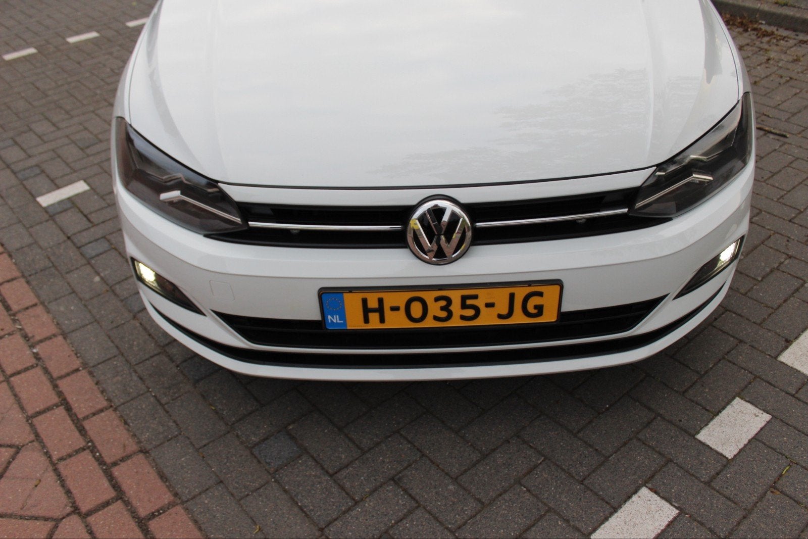 Volkswagen Polo 1.0 TSI 95pk 2019 Wit, Auto's, Volkswagen, Voorwielaandrijving, Stof, Handgeschakeld, 570 kg