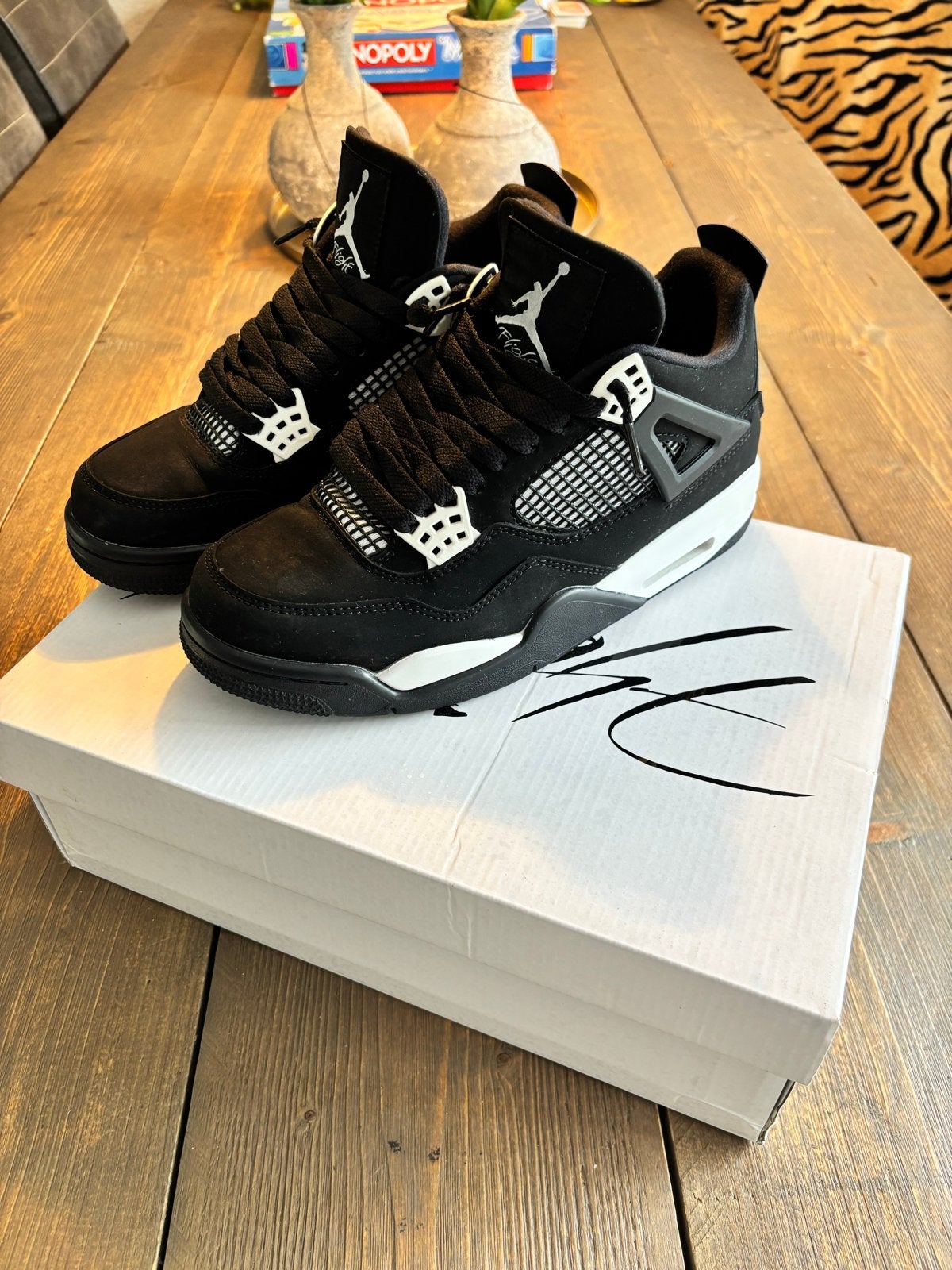Nike Air Jordan 4 Retro Black Cat - Zo goed als nieuw, Ophalen of Verzenden, Zo goed als nieuw, Zwart, Sneakers of Gympen