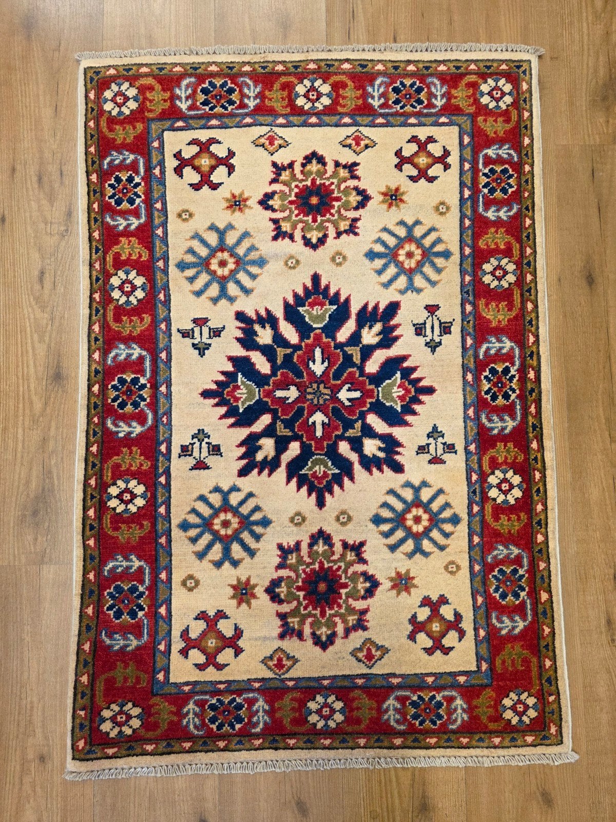 Handgeknoopt oosters tapijt kazak 117x78
