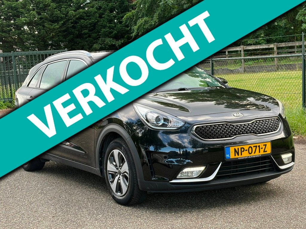 Kia Niro 1.6 GDi Hybrid First Edition /Navi/Camera/Trekhaak/, Auto's, Gebruikt, Euro 6, Leder en Stof, Zwart