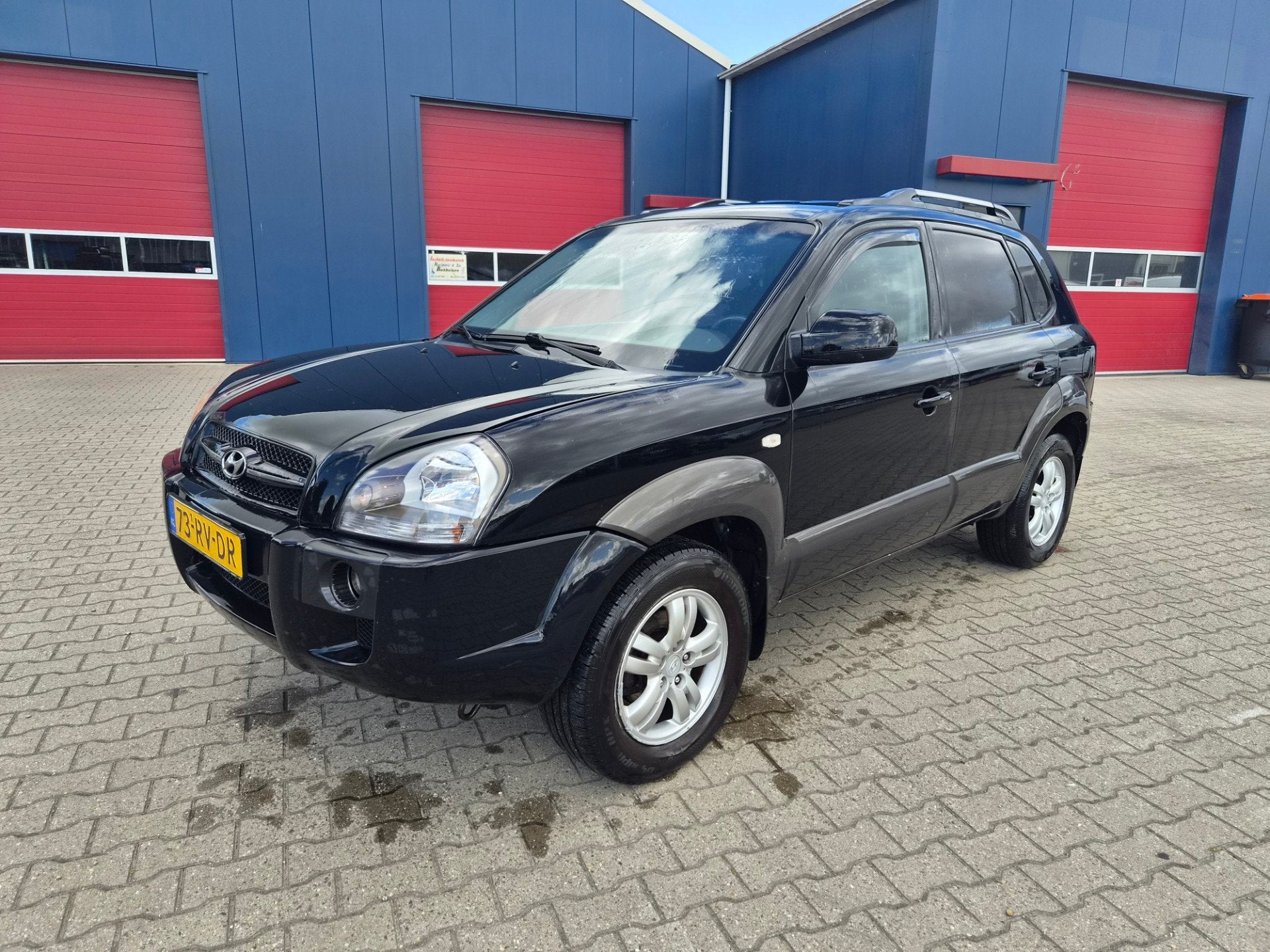 Hyundai Tucson 2.0i Style LPG, Auto's, 13 km/l, Stof, Gebruikt, Zwart