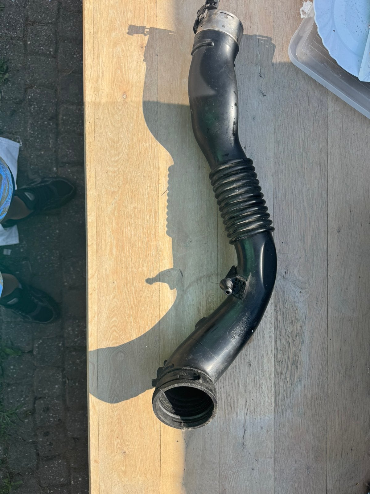 BMW intercooler luchtinlaatslang, Ophalen