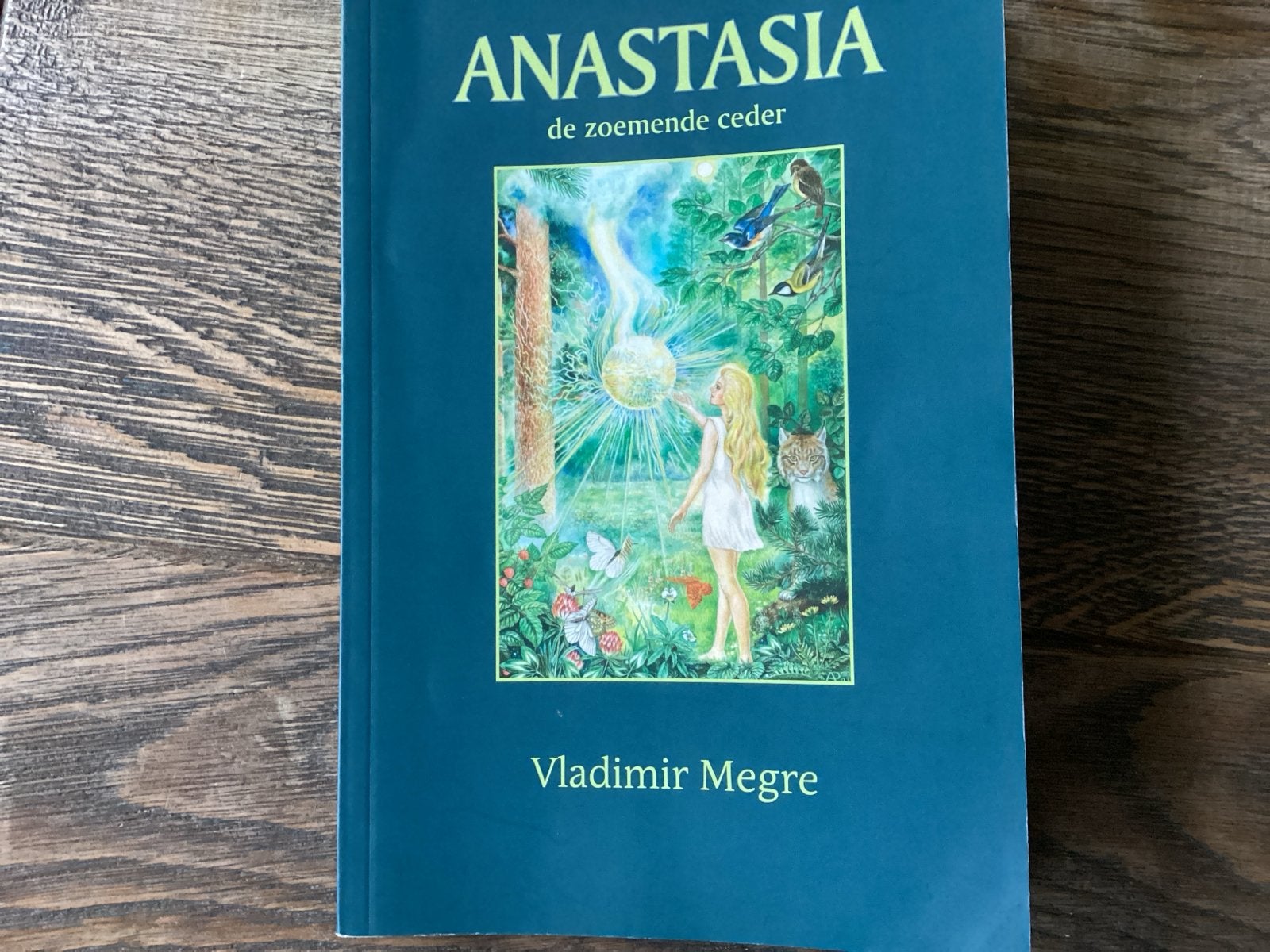 Anastasia - De Zoemende Ceder (Deel 1), Boeken, Ophalen of Verzenden, Gelezen, Spiritualiteit algemeen, Verhaal of Roman