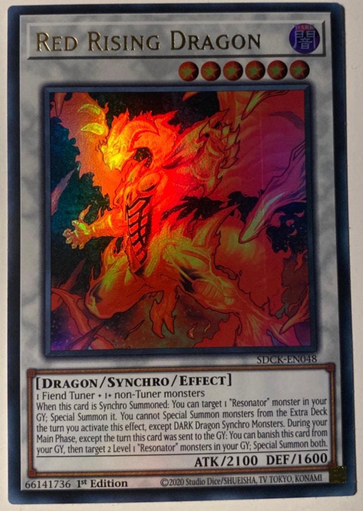 Yu-Gi-Oh! Red Rising Dragon SDCK 1st Edition !, Ophalen of Verzenden, Zo goed als nieuw, Losse kaart, Foil
