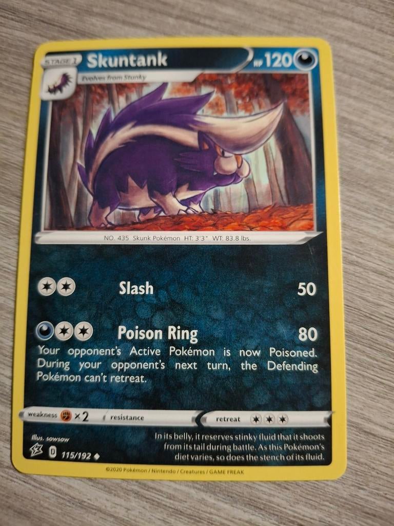 Pokémon Kaart Skuntank 115/192, Ophalen of Verzenden, Zo goed als nieuw, Losse kaart