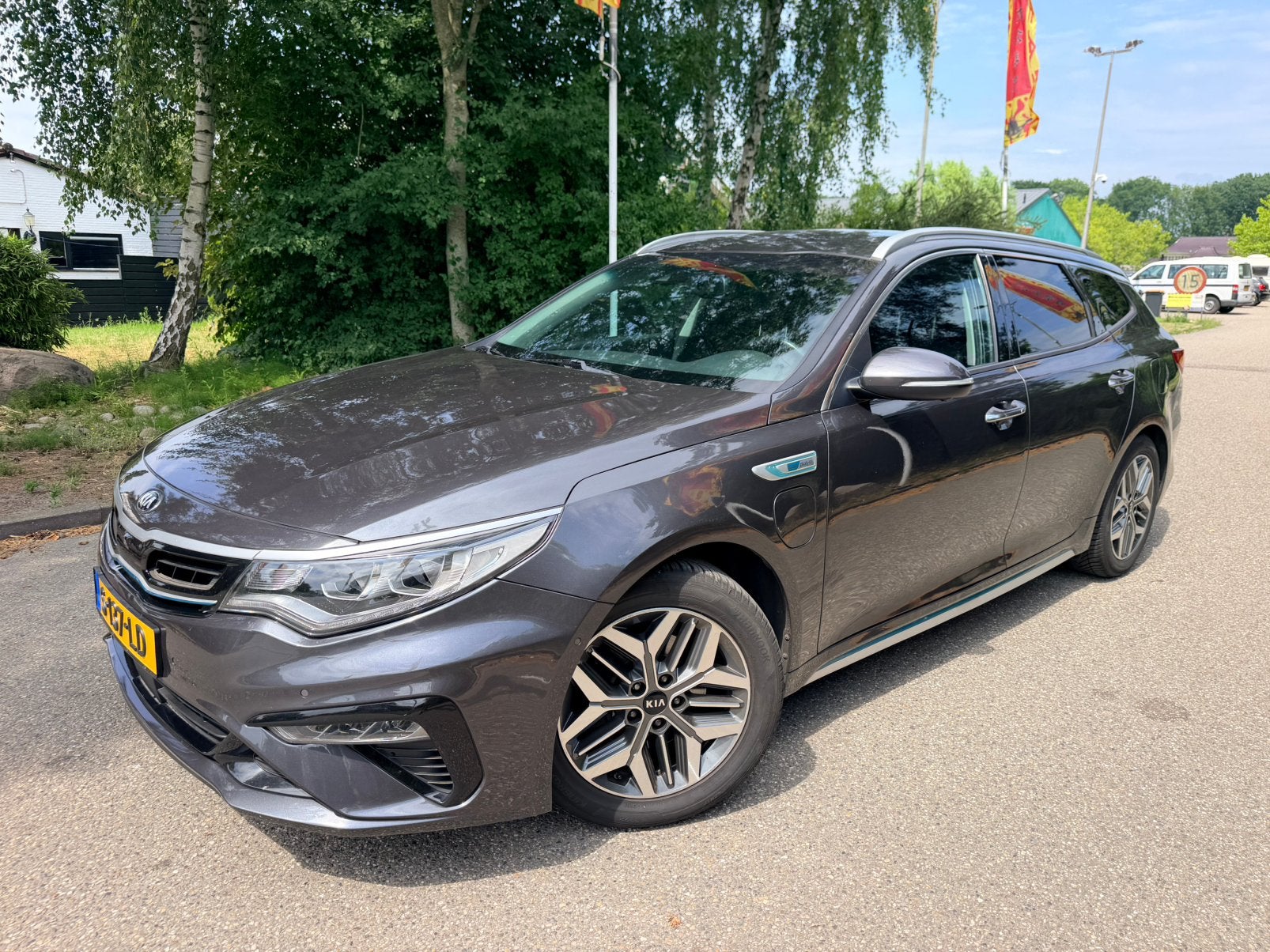 Kia Optima Sportswagon 2.0 GDi Phev Executive line 205pk, Zwart, Hybride Elektrisch/Benzine, 102 €/maand, Optima Sportswagon