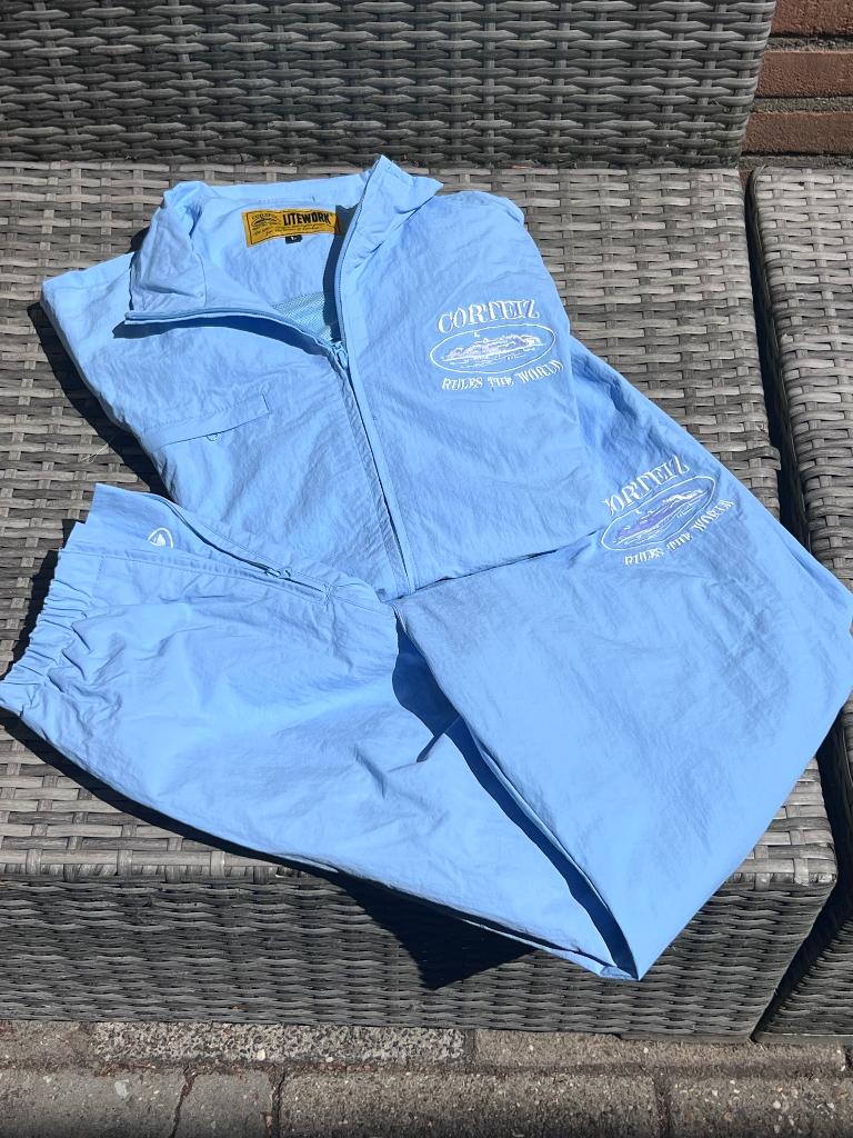 Trainingspak blauw, Ophalen of Verzenden, Nieuw, Maat 52/54 (L)