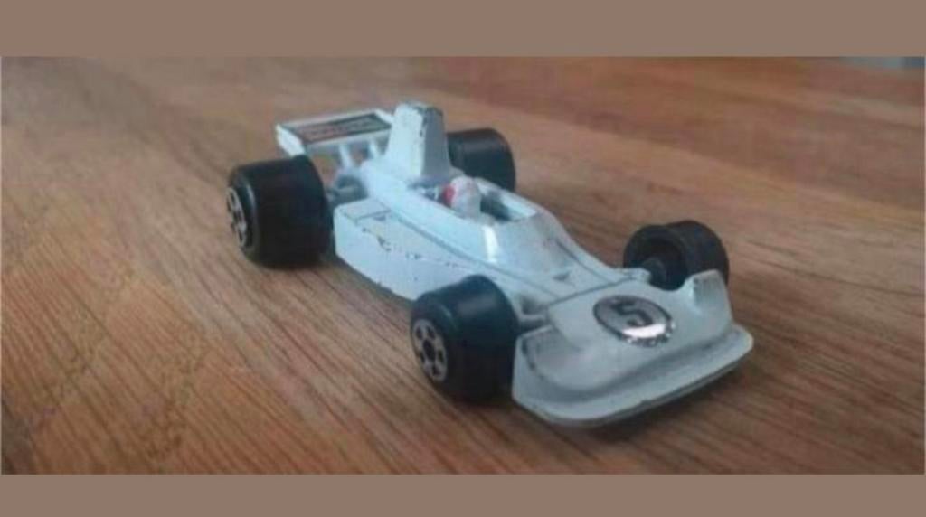 Winner Hesketh 308E Formule 1 nr. 7715 – Made in Hong Kong, Hobby en Vrije tijd, Modelauto's | Overige schalen, Gebruikt, Auto