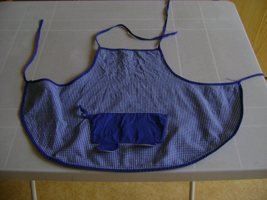 blauw/wit geruit schortje 1maat met zakje met oren jaren 70, Ophalen of Verzenden, Gebruikt, Overige materialen, Speelkeuken-accessoire
