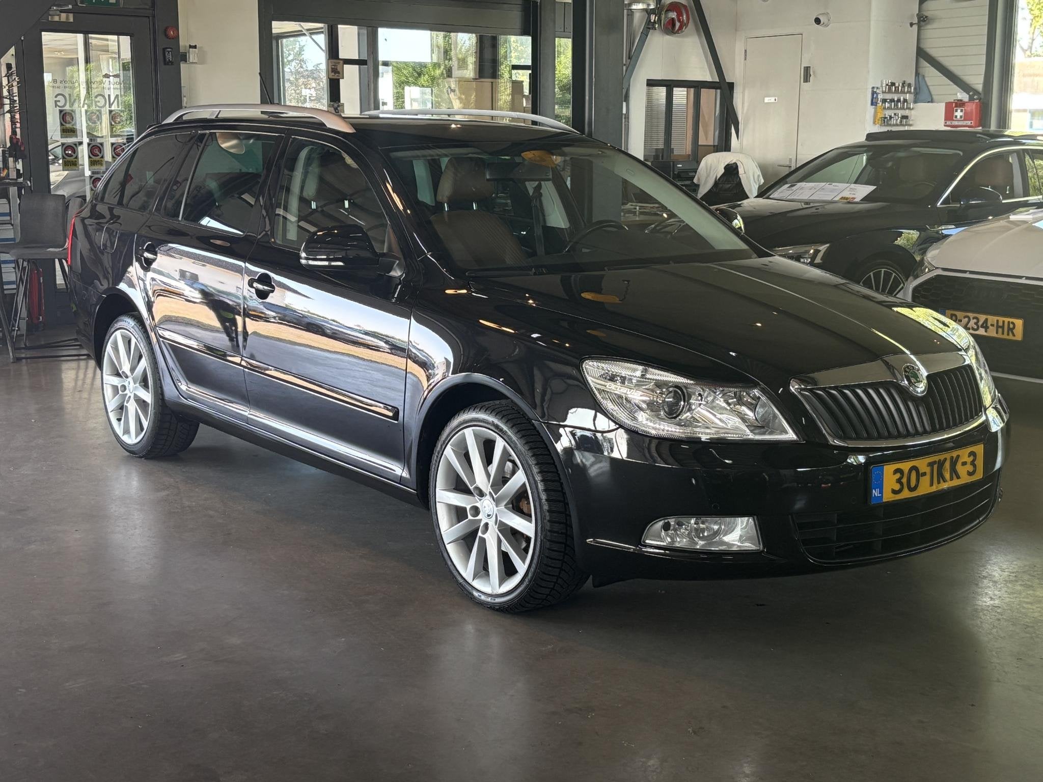 Skoda Octavia Combi 1.2 TSI Elegance Business Line, Auto's, Euro 5, Stof, Gebruikt, 4 cilinders