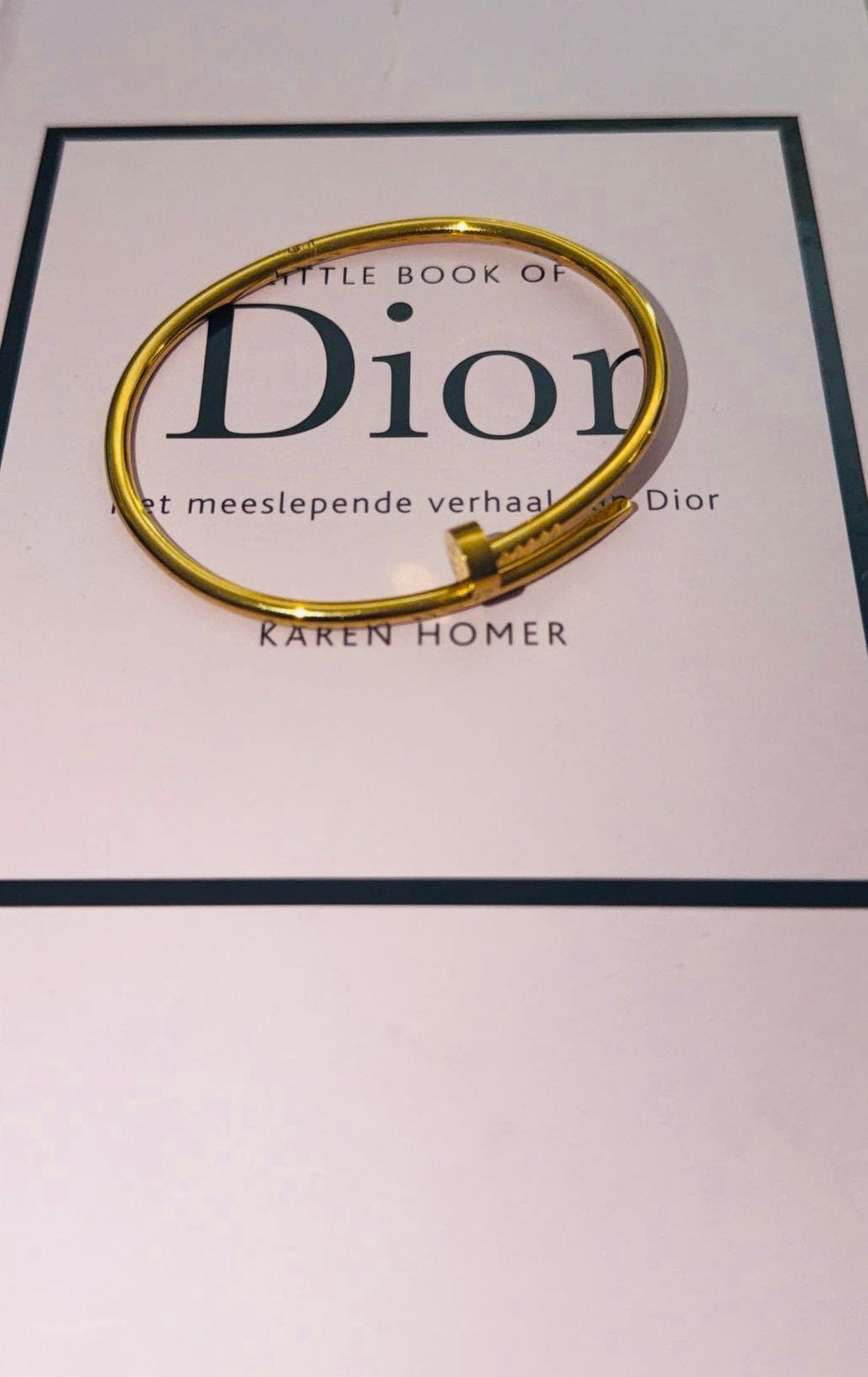 Armbandje met logo, Ophalen of Verzenden, Zo goed als nieuw, Goud, Overige materialen