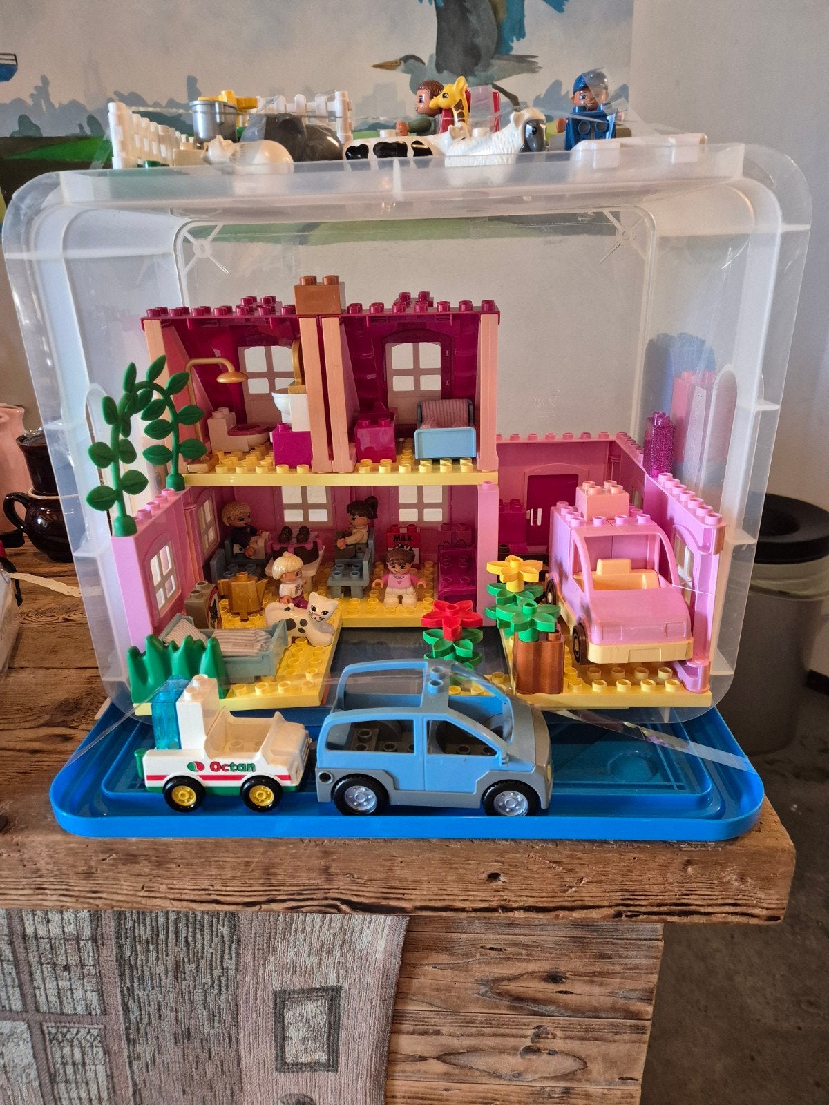 duplo  huis met auto s, Ophalen