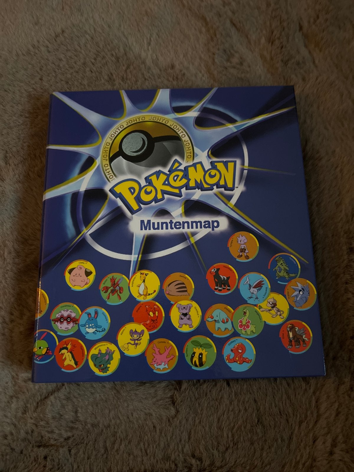 Complete Pokémon muntenmap Konmar Super de Boer, Ophalen of Verzenden, Zo goed als nieuw, Overige typen